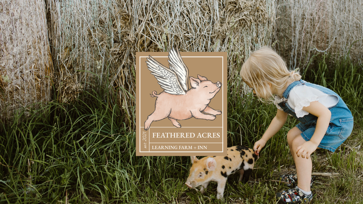 Esther with a pig on the farm